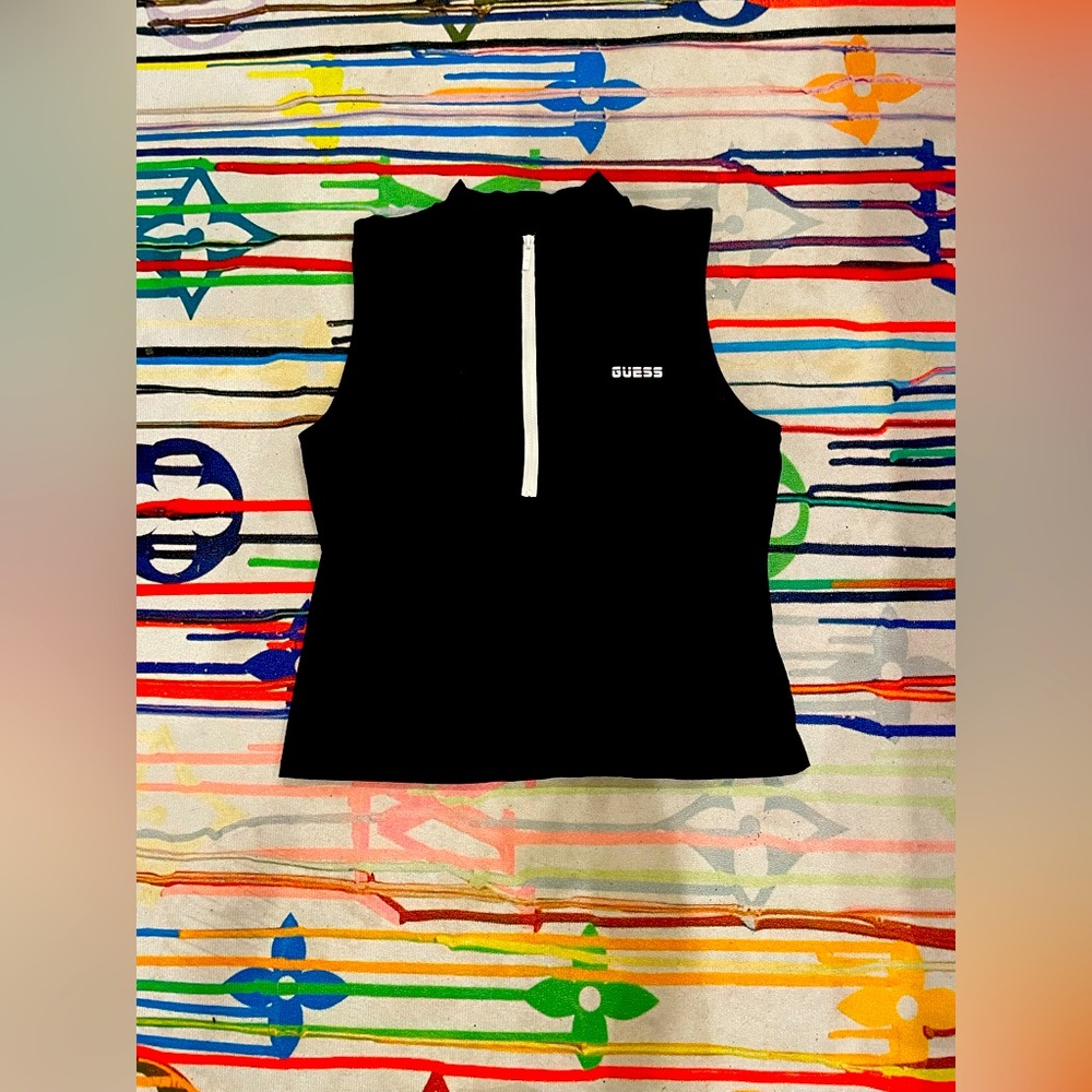 Guess Cut off sleeve vest- White zip at the front